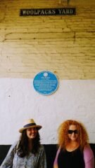 Emma and Sarah with Ann Hurst's blue plaque