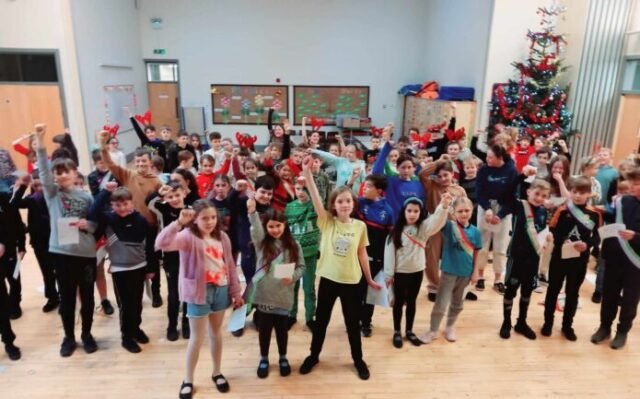 children enjoying a history talk in a wakefield school